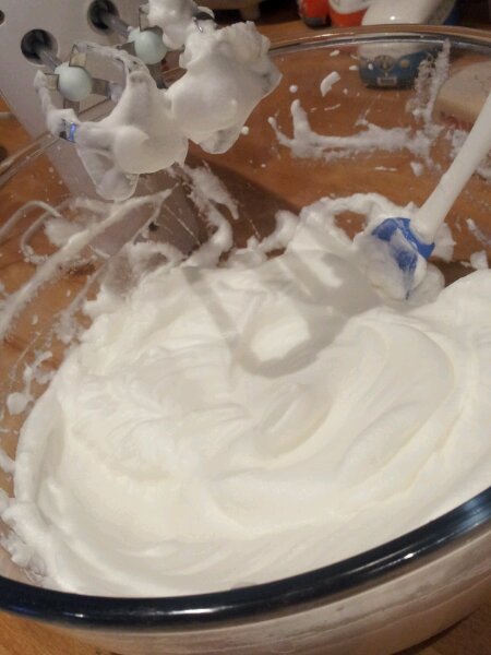 Whisking the egg whites to make Rocambole