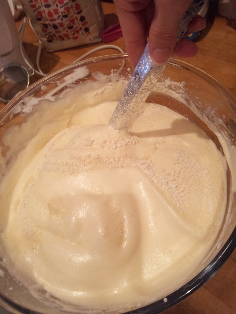 Fold in the tiny amount of flour and baking powder