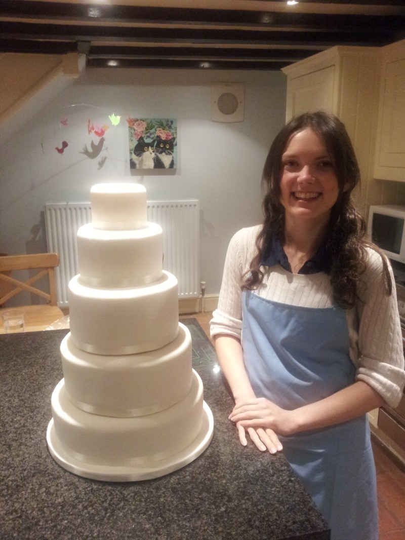 Me and my pride an joy - The 5 Tier iced wedding cake with ribbon in Kate's wonderful kitchen