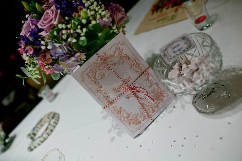 The table favours petite Italian Lavender Merinuges in vintage glass wear with nostalgic photos for our guests