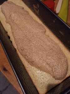 Raw spiced batter straight on top of the cooked cake below