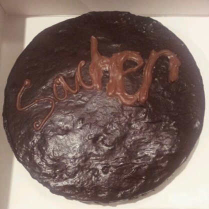 Oh dear it's all gone a bit wrong, but here's my SacHER torte. Check out that glossy ganache (and ignore my terrible chocolate icing skills...)