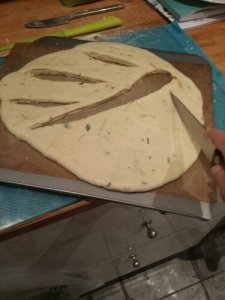 Make 3 diagonal cuts at an angle from your central cut fougasse recipe