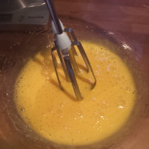 Whisk 8 eggs yolks with the sugar