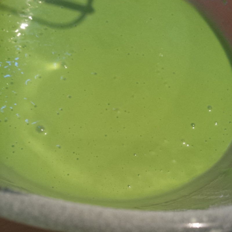 Whisking in the glutinous rice flour - How bright is the batter!