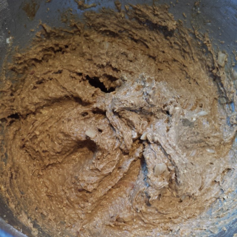 Russian Black Bread: Mix the wet and dry ingredients together, adding more flour as necessary before kneading for 10 minutes