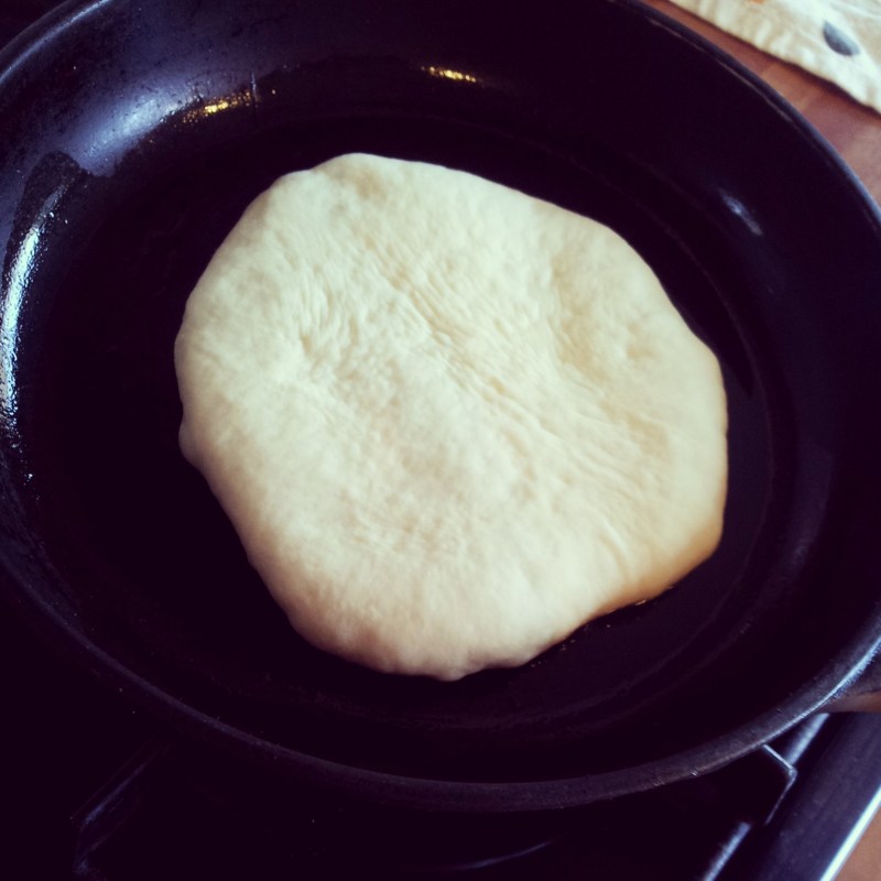 Bazlama hitting the cast iron pan