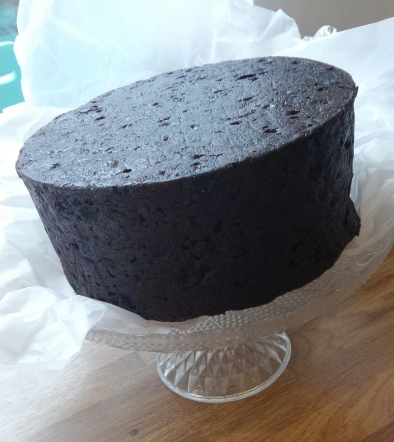 image of 3 year old fruit cake preserved in brandy ready for transforming into christening cakle